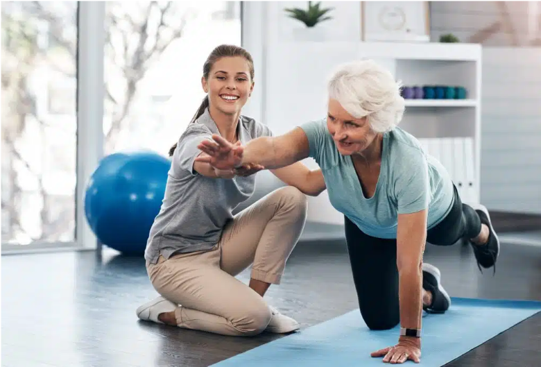 Rehabilitation Therapy New York session with physical therapist assisting patient recovery exercises in modern medical clinic
